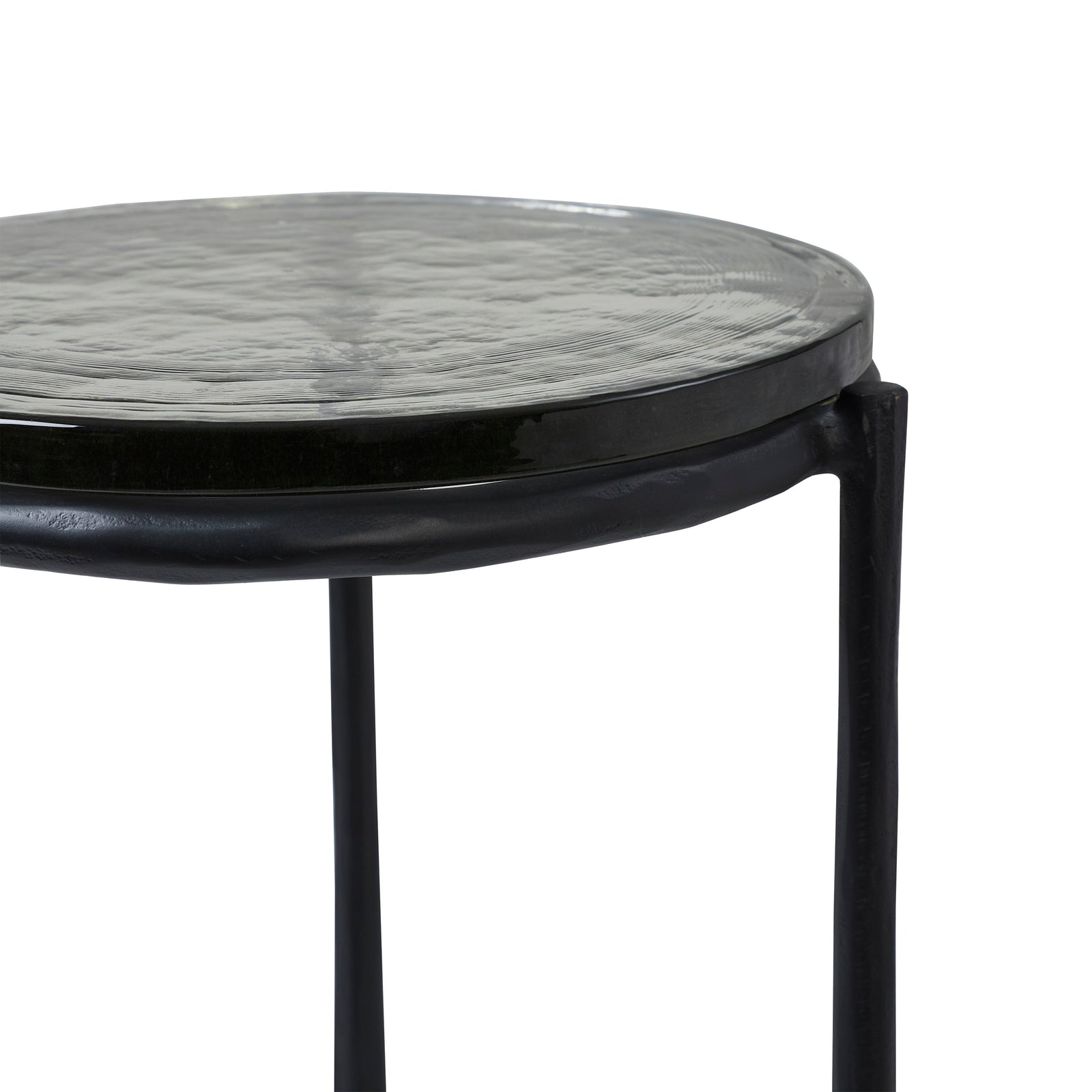 Avila Side Table with a round black top and slender black legs