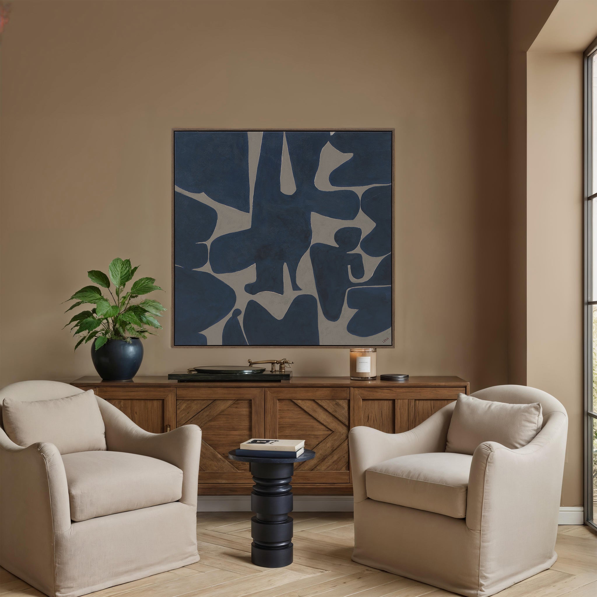 Valerio canvas art featuring abstract shapes in navy and gray tones, framed in wood.