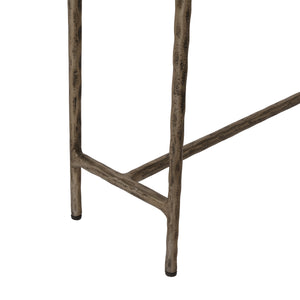 Close-up of Nara console table showing the textured silver metal legs.