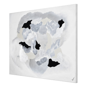 Alasia canvas art displayed at an angle, showcasing abstract gray and black patterns.