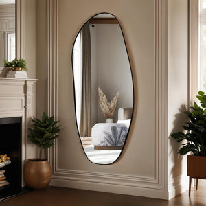 Enina mirror by Renwil displayed in a stylish room, reflecting decor with a modern black outline.