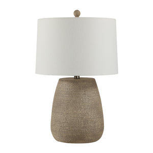 Optima table lamp with a textured beige base and white fabric shade.