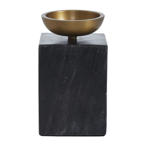 Poema candle holder featuring a black square base and a brass bowl, viewed from the front