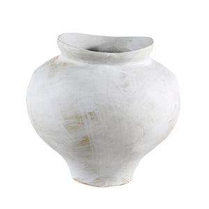 Elia vase in white ceramic with a unique shape and soft beige highlights.