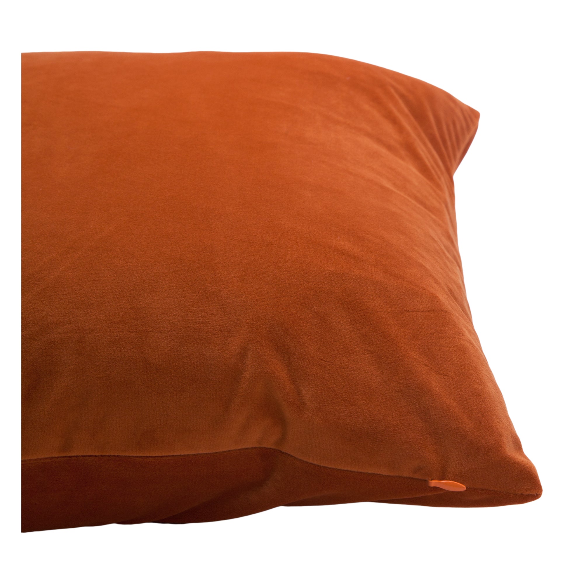 Prato Indoor Pillow in rich orange velvet, angled view showing soft texture and subtle seam detail.