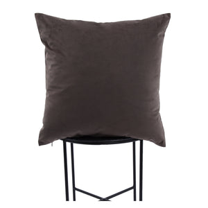 Chestnut Indoor Pillow in dark brown velvet, displayed on a black metal stand.