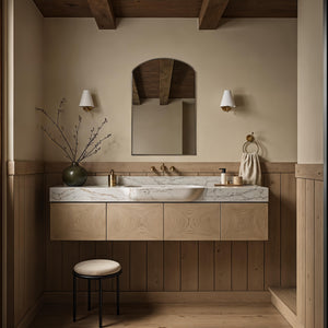 Clarisse mirror above a marble sink with wooden cabinetry in a modern bathroom setting.