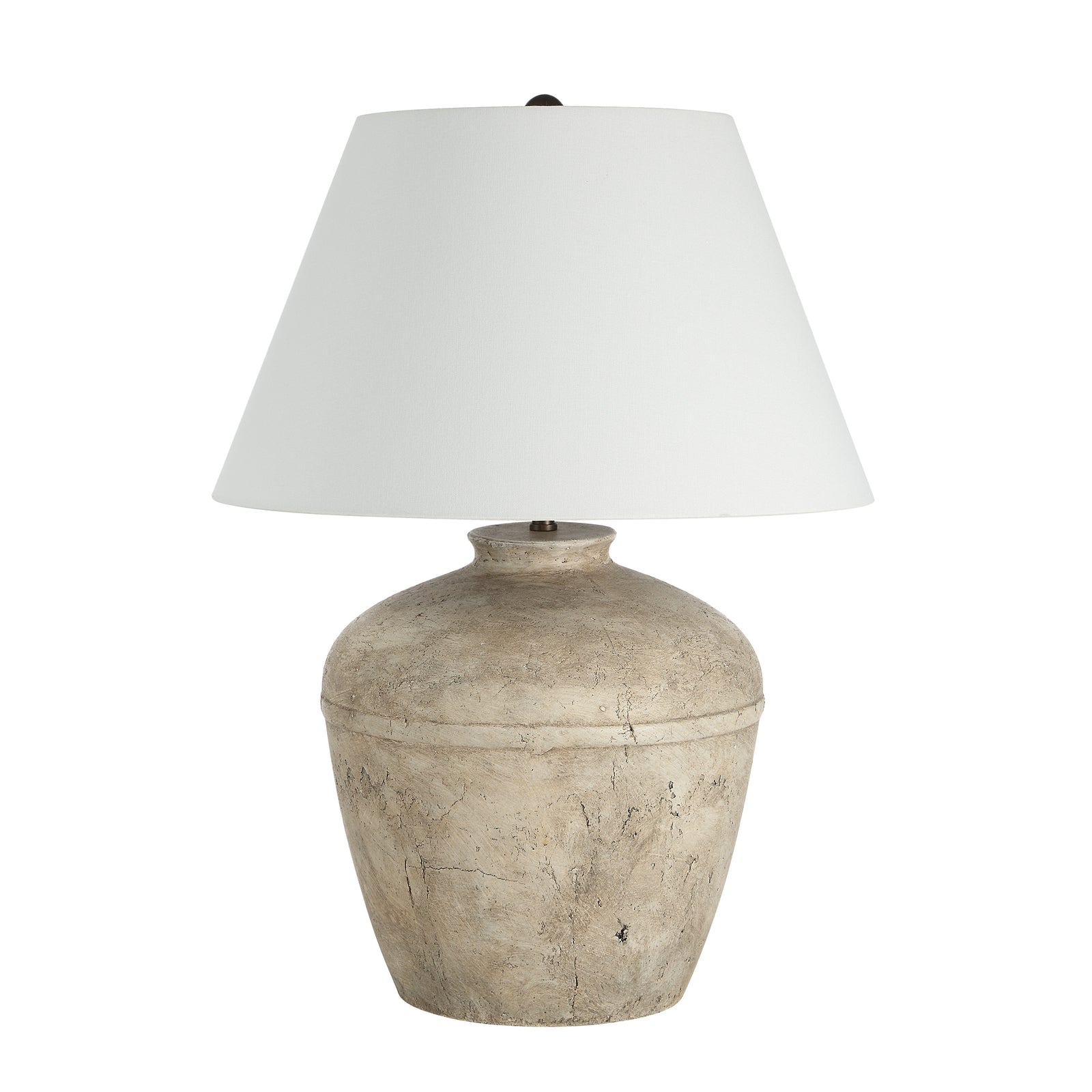 Heritage table lamp with a textured beige ceramic base and a white fabric shade.