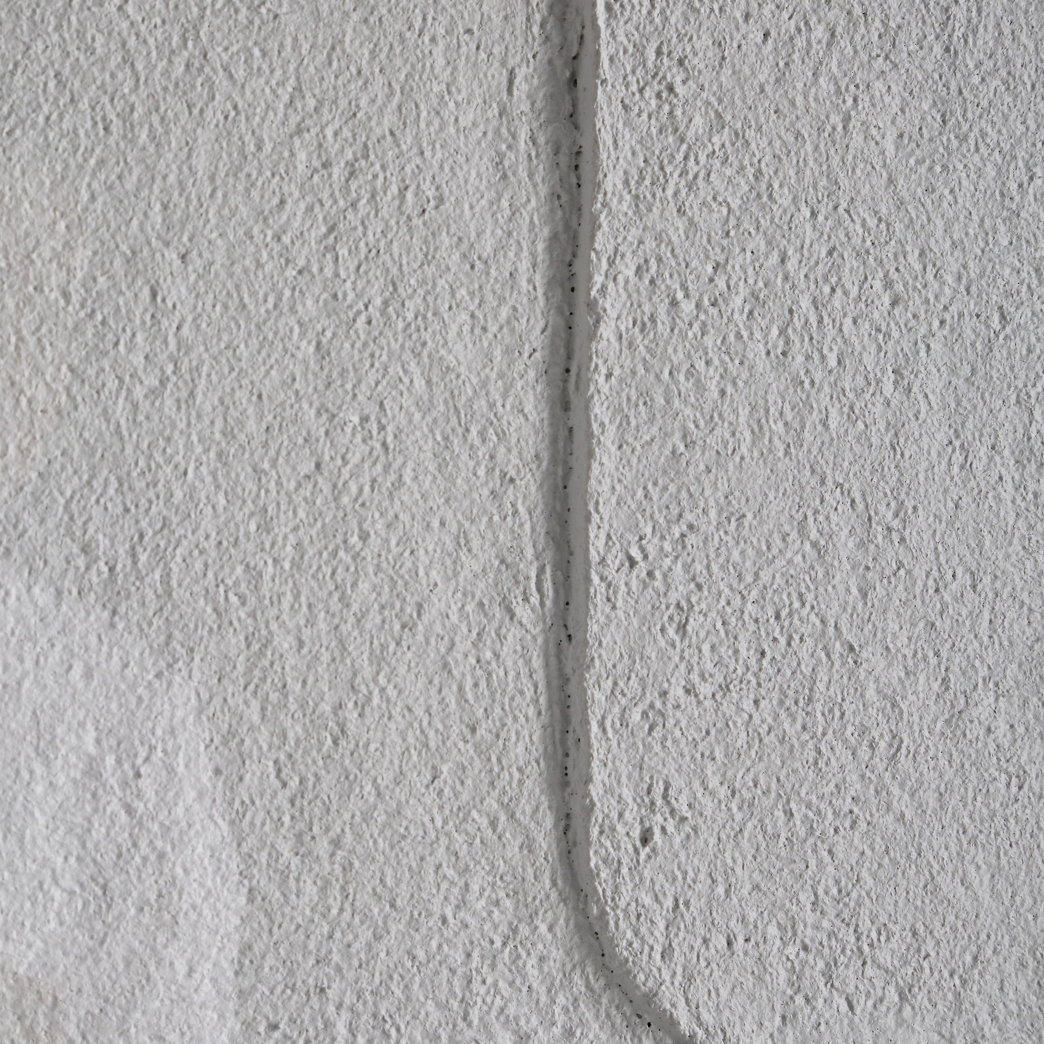 Close-up of textured white panel from Arches wall art