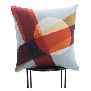 Lamego indoor pillow displayed on a black stand, featuring a colorful geometric design