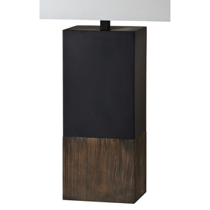 Broma Table Lamp showcasing a sleek black body and wooden base, topped with a white shade.