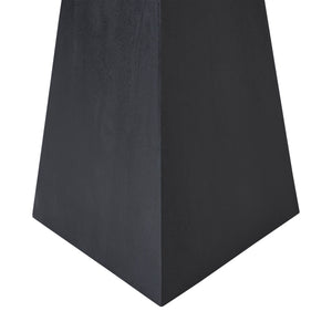 Moulin Side Table featuring a black, angular base with a tapered design.