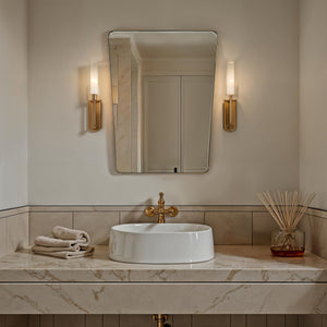Mily mirror by Renwil, rectangular shape with a sleek silver frame, mounted above a marble sink.