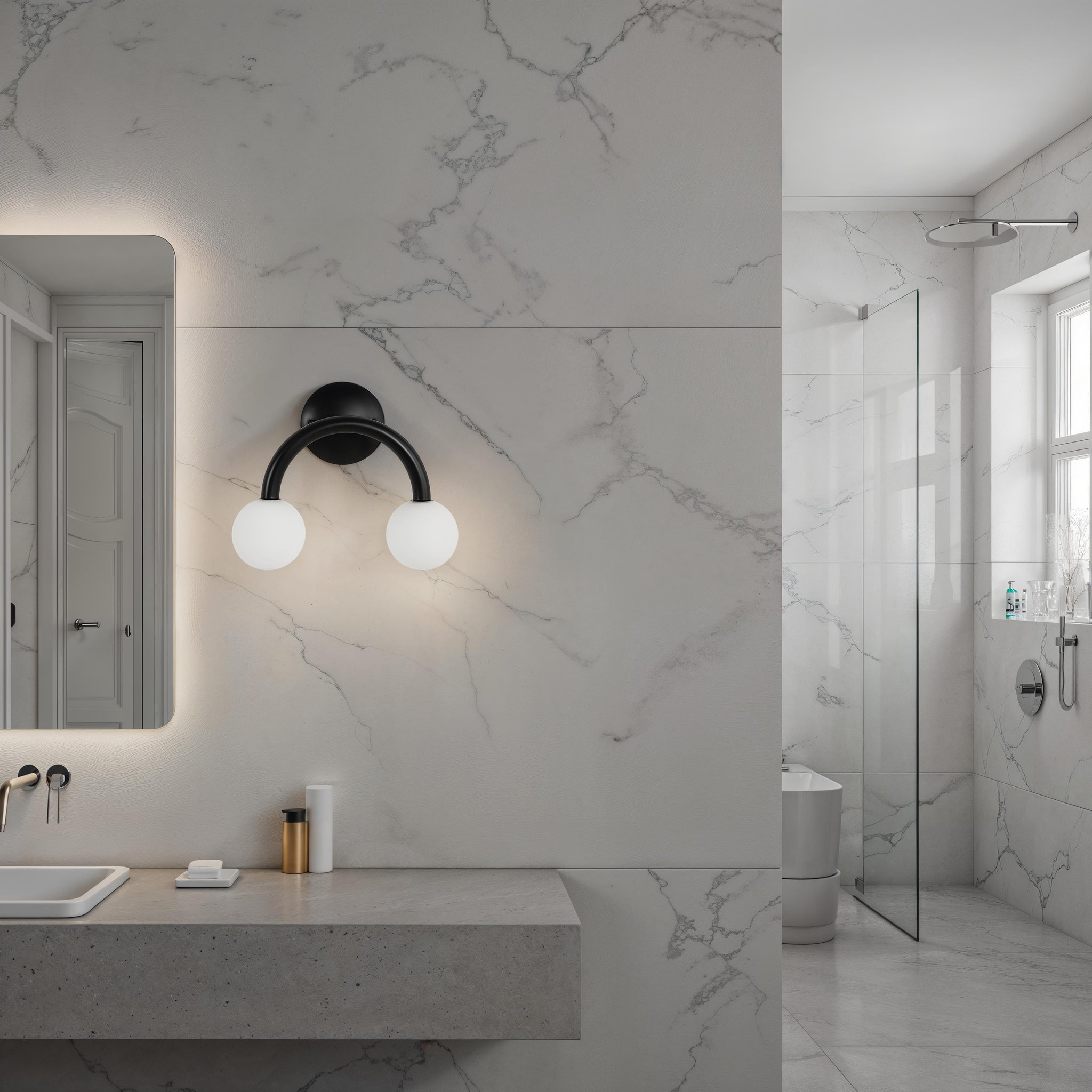 Santo wall sconce installed in a modern bathroom with marble walls