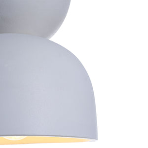 Kala Ceiling Fixture in textured gray finish, featuring a rounded design with a warm light glow.