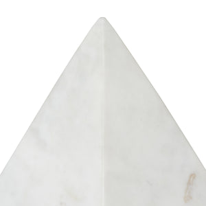 Symmetra statue featuring a sleek, pointed design in white marble with subtle veining details.