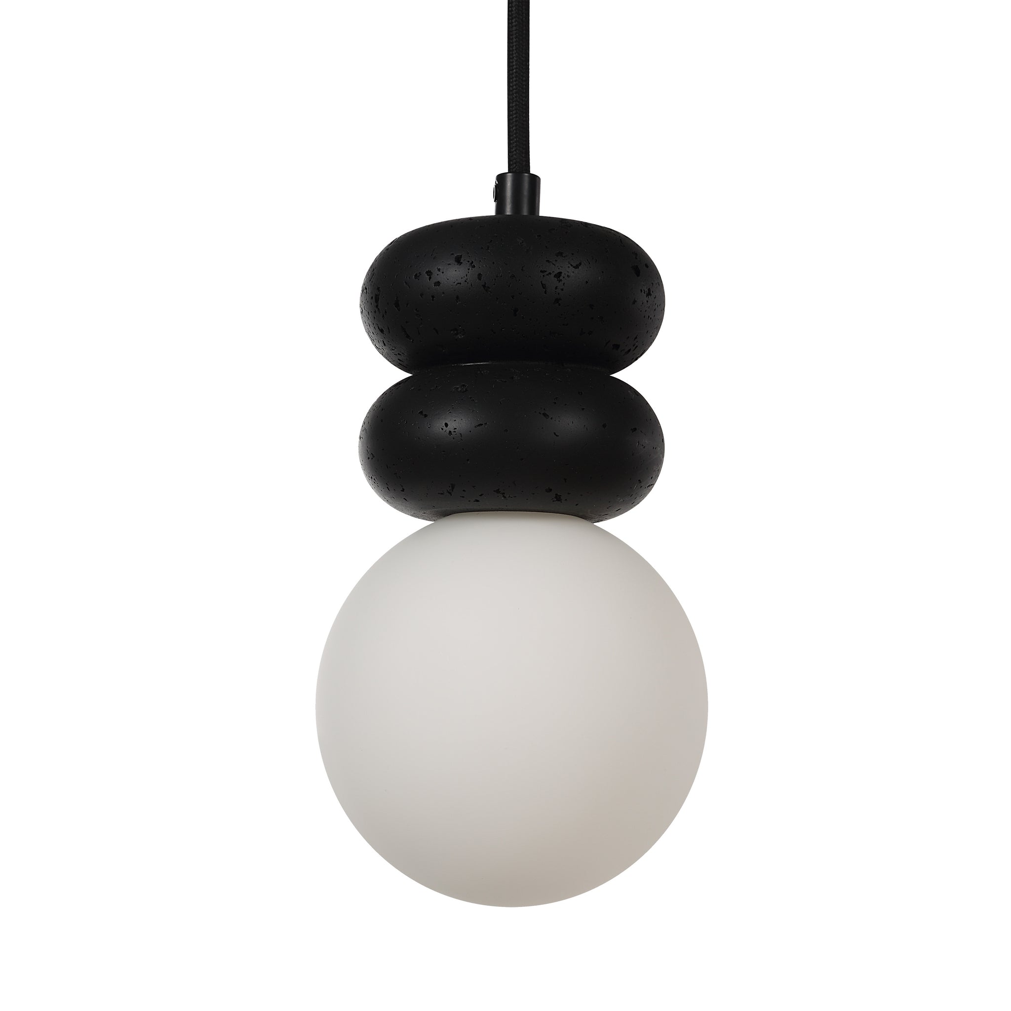 Solene pendant light featuring a white glass globe and two black textured orbs