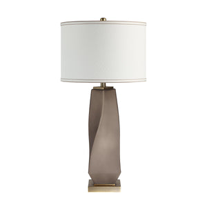 Mallorca table lamp featuring a sleek gray base and a white shade with gold trim