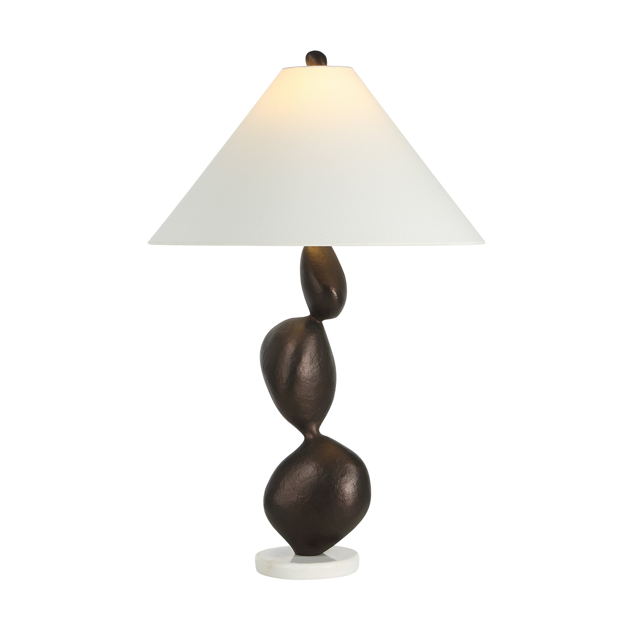 Elle table lamp by Renwil illuminated, featuring a brown sculptural base and white shade.