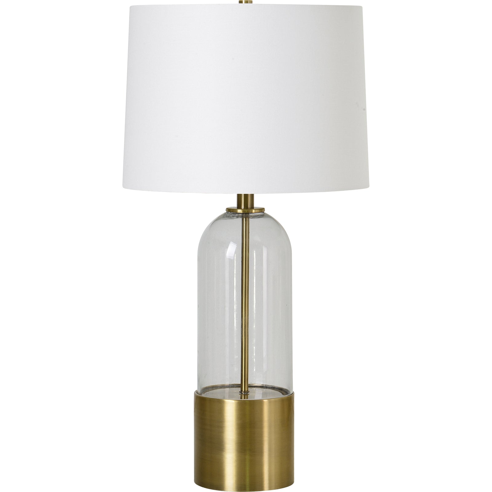 Theodore Table Lamp with a clear glass body and brass base, topped with a white fabric shade.