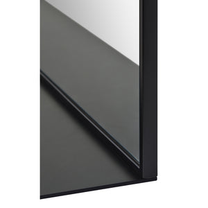 Wearstley Wall Mirror with a sleek black frame, showing a close-up of the edge and reflective surface.