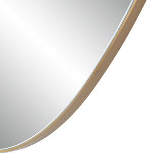 Close-up of Noria Wall Mirror showing the smooth surface and gold frame detail