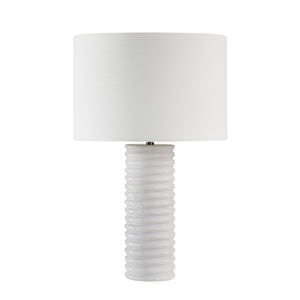 Alloro Table Lamp with a white cylindrical shade and a ribbed white ceramic base