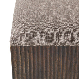 Top view of Tristan stool showcasing herringbone fabric and dark wood base.
