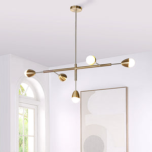 Naura Ceiling Fixture installed in a room, highlighting its gold finish and modern aesthetic
