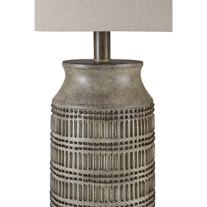 Close-up of Tarragona Table Lamp showing detailed gray ceramic base and beige shade.