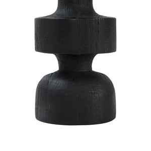 Close-up of Beckton statue by Renwil, black color, showcasing rounded base and textured surface.