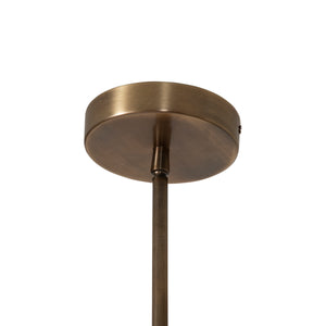 Brillio pendant light with a round antique brass canopy and slender rod, viewed from below against a white background.